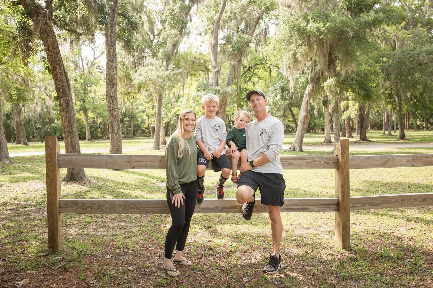 The Canopy Carvers family, owners of the business, in Palm Coast, FL